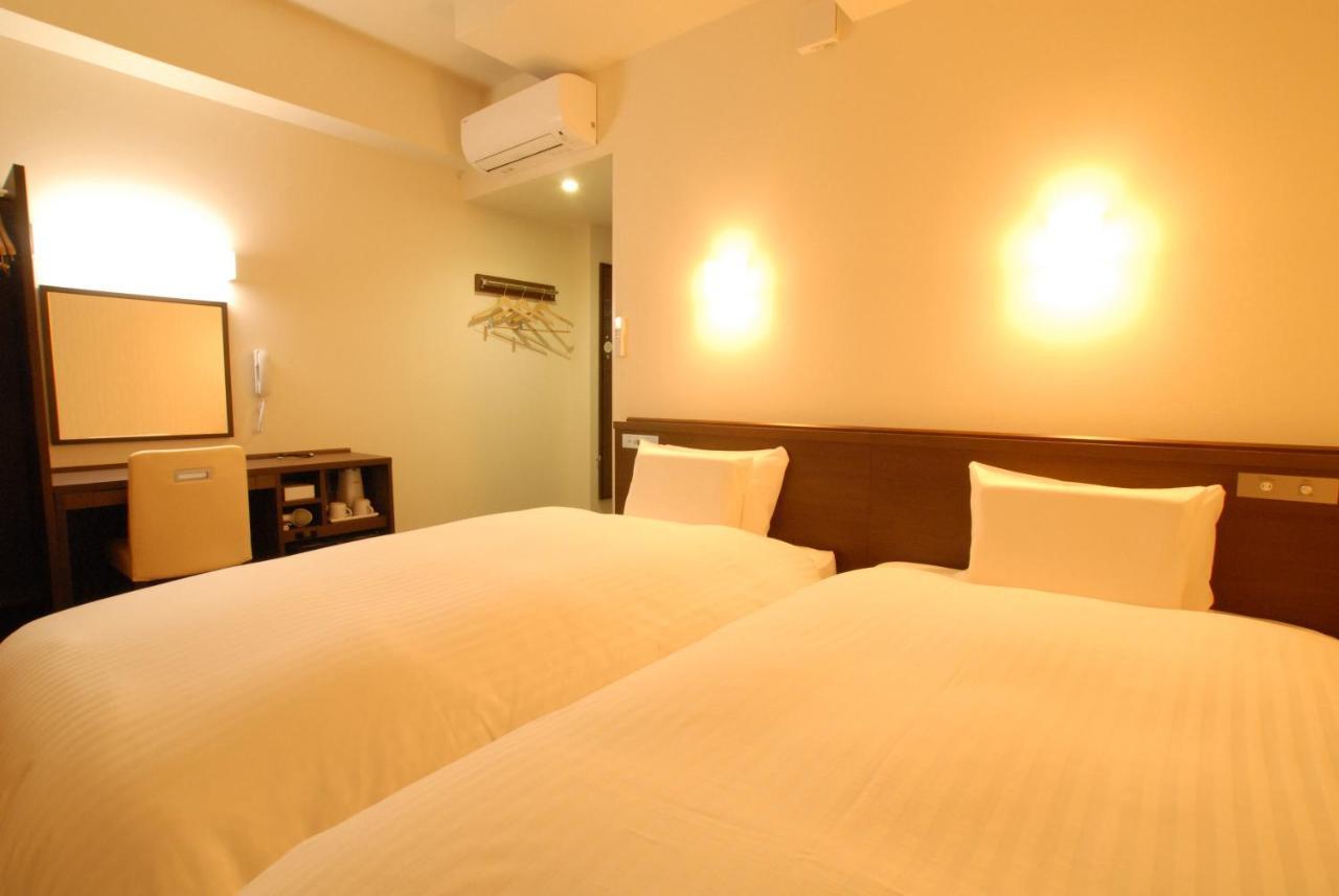AB Hotel Iwata Bagian luar foto