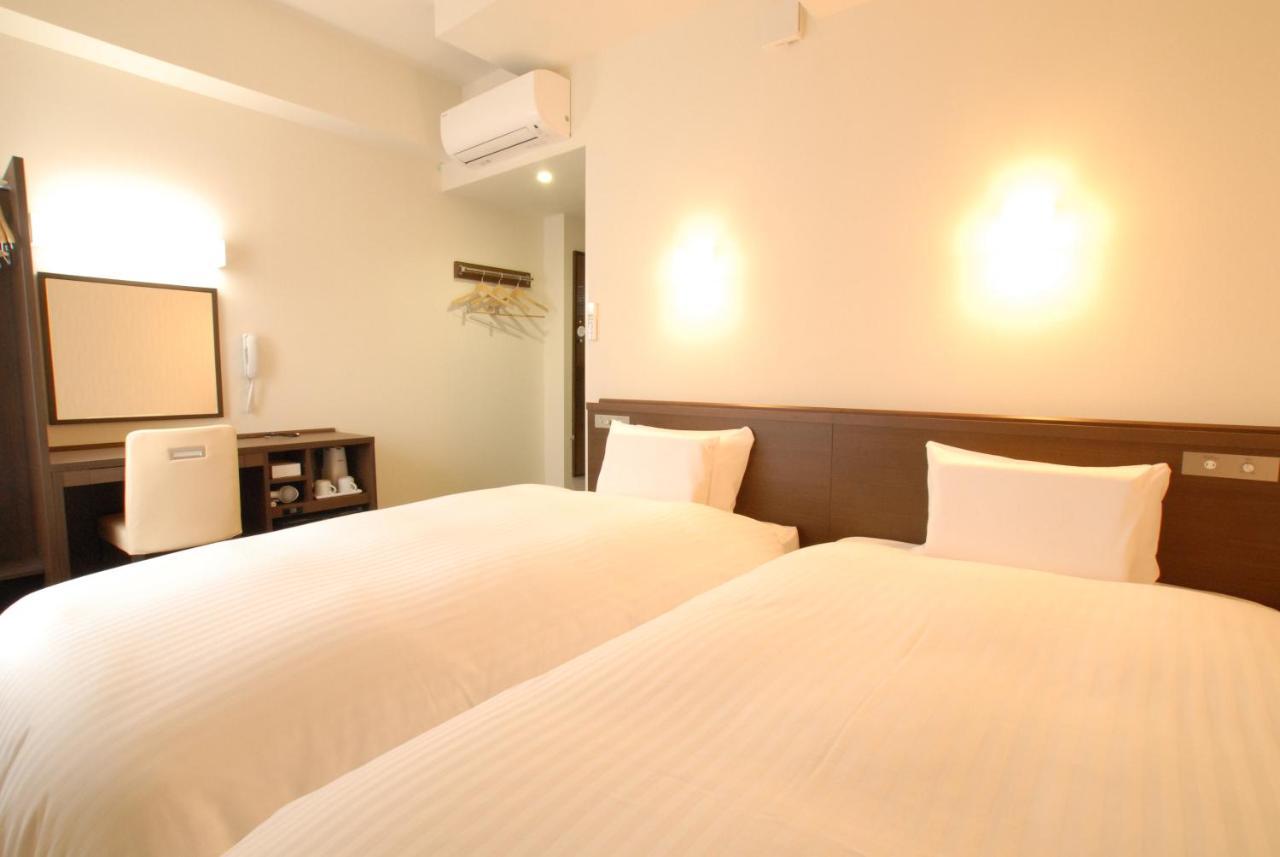 AB Hotel Iwata Bagian luar foto