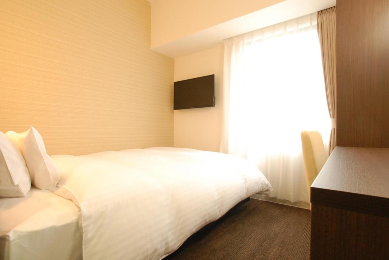 AB Hotel Iwata Bagian luar foto
